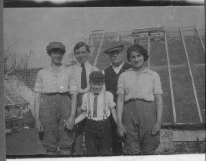The Young family l to r: May, Theodore, William, Nell. In front is Gerald. Taken at Wallace Nurseries. (thanks to Malcolm Linfie